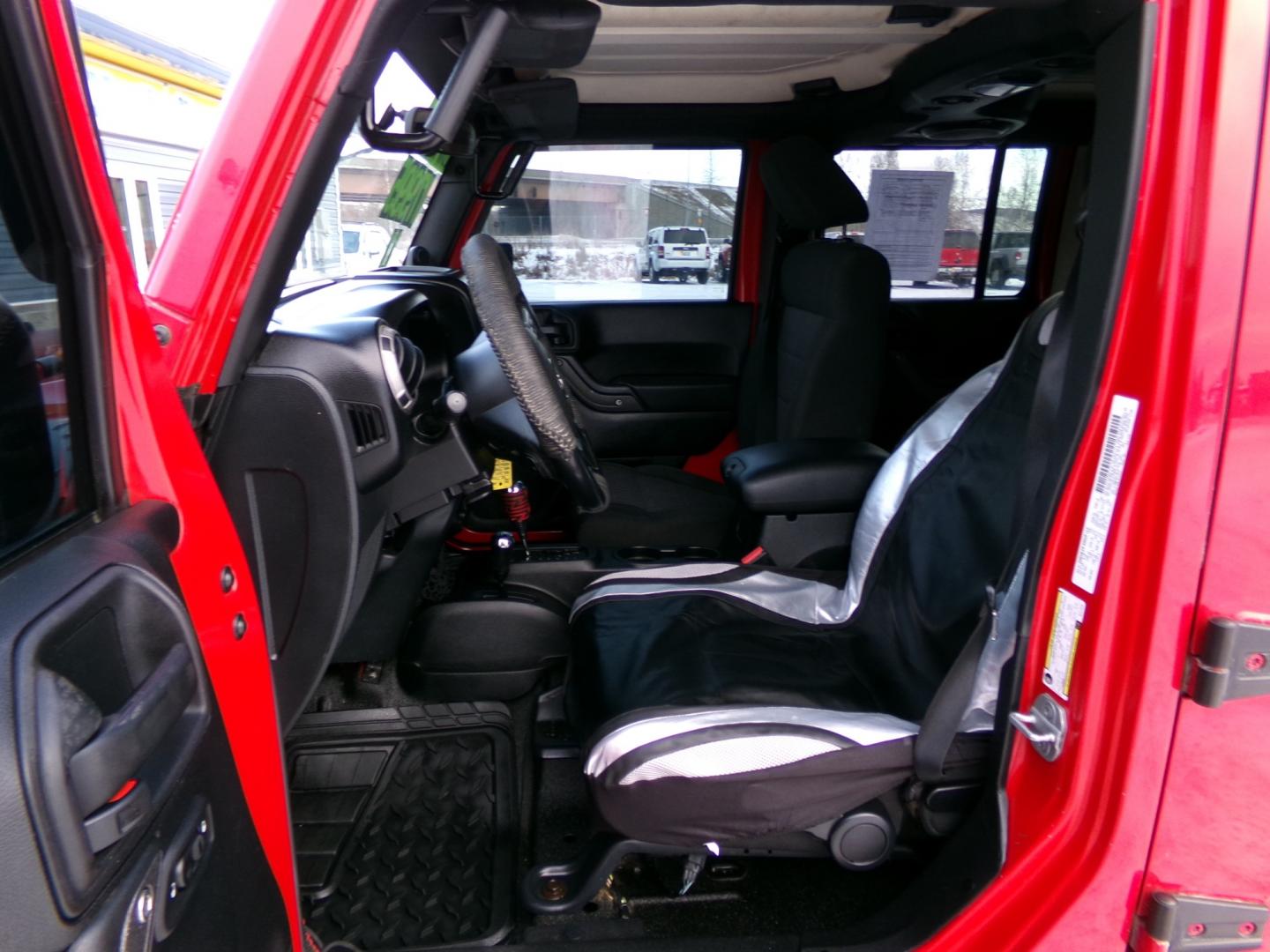 2015 Red /Black Jeep Wrangler Unlimited (1C4HJWEG0FL) with an 3.6L V6 DOHC 24V FFV engine, located at 2630 Philips Field Rd., Fairbanks, AK, 99709, (907) 458-0593, 64.848068, -147.780609 - Photo#4